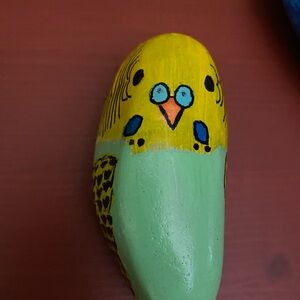 Hand painted parakeet on natural rock 3.19”